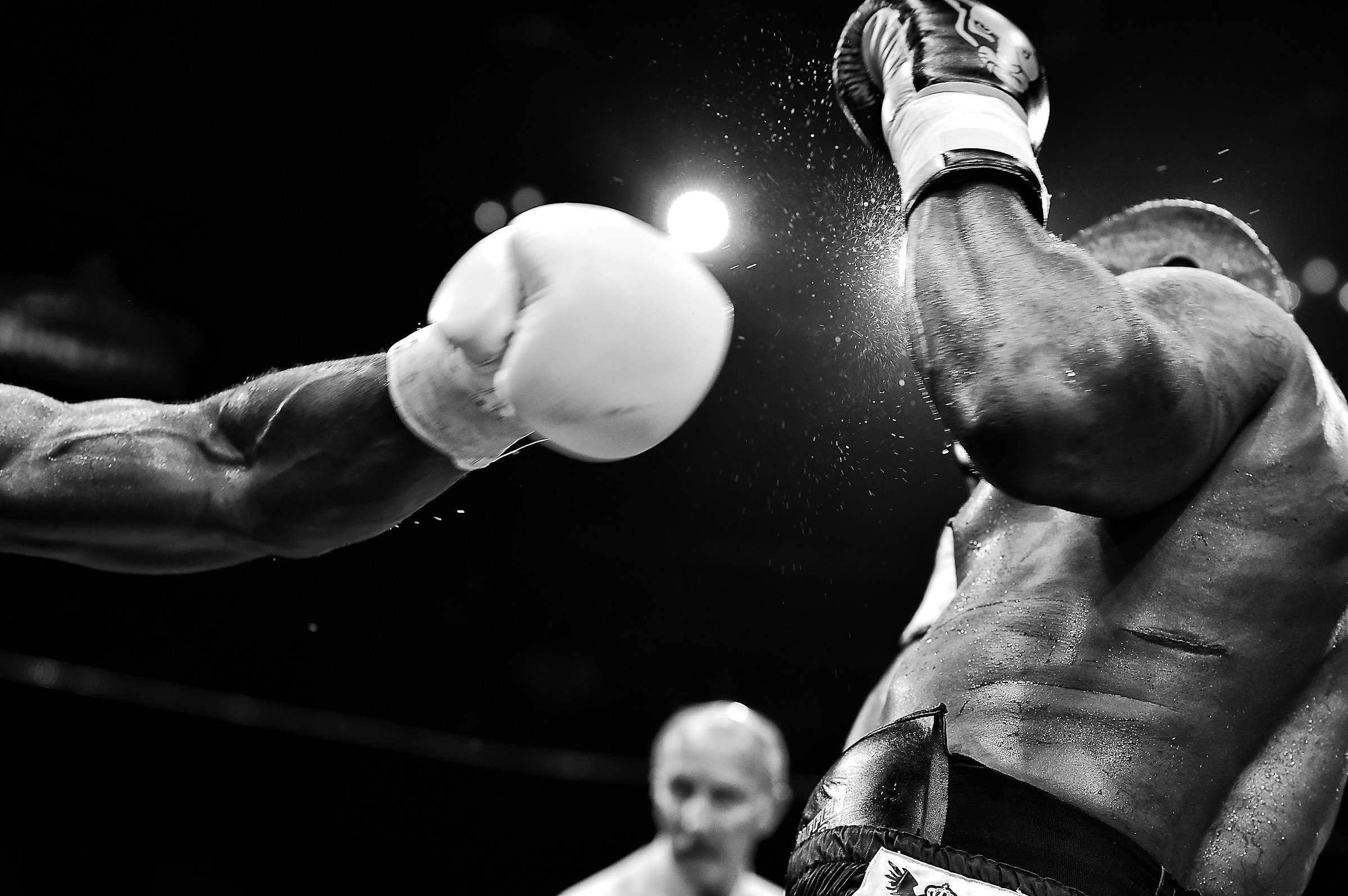 Boxing match under bright arena lights