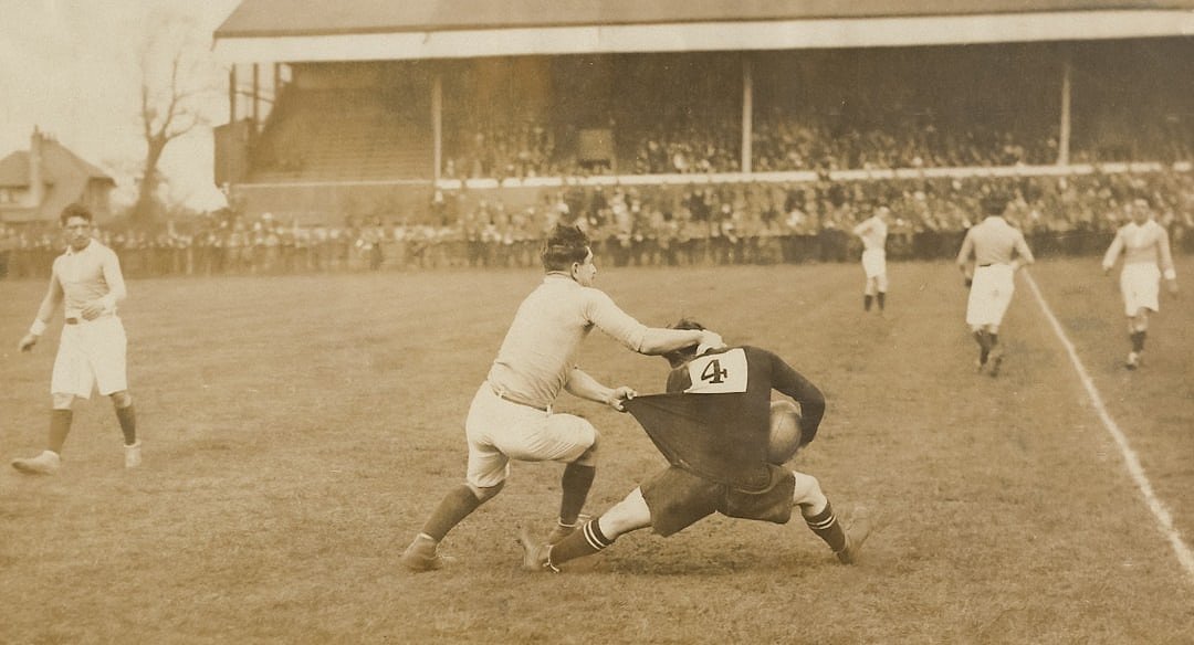 Early football match in the late Victorian era