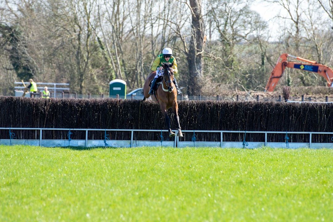 Jockey riding at pace during a race at Ascot Racecourse
