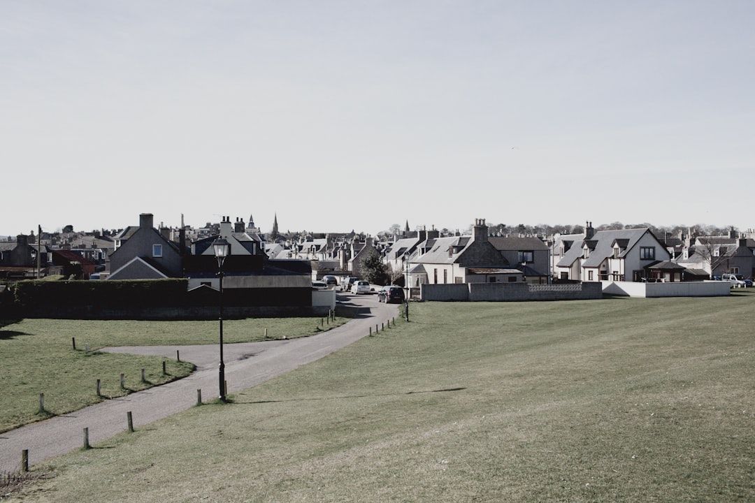 A Scottish seaside town, evoking the coastal setting of early Open Championship venues