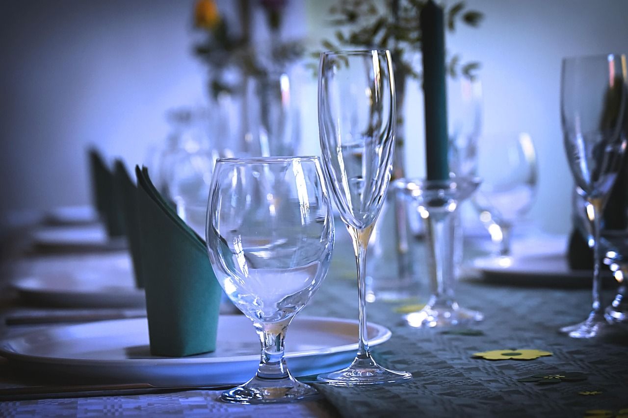 An elegant fine dining table setting with crystal glassware