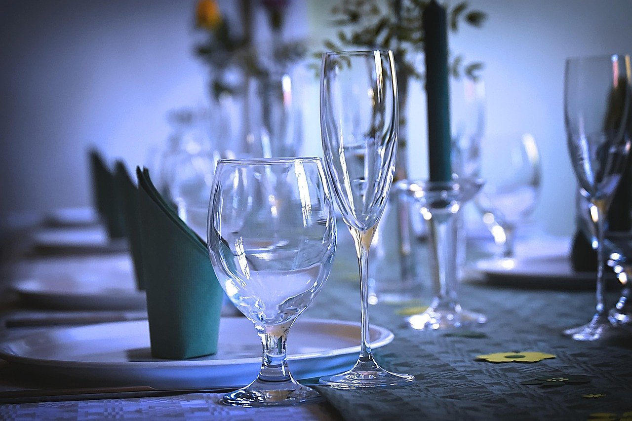 An elegant fine dining table setting with crystal glassware