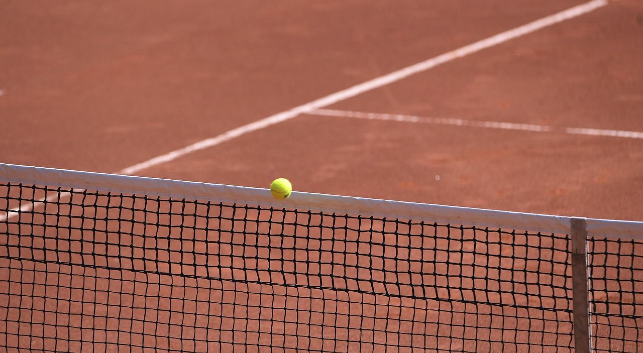 Clay court surface with distinctive red-orange colour