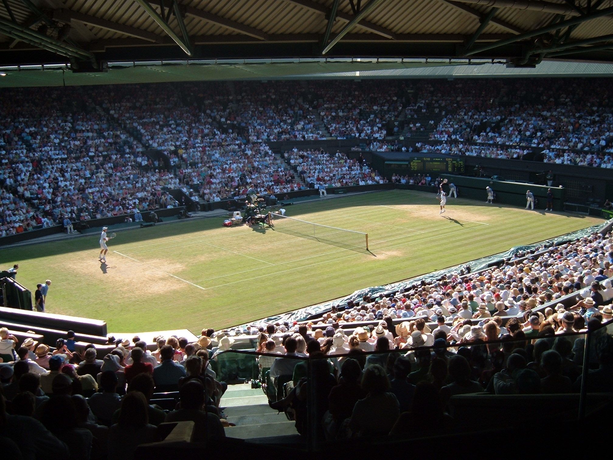Flowers with Wimbledon sign behind
