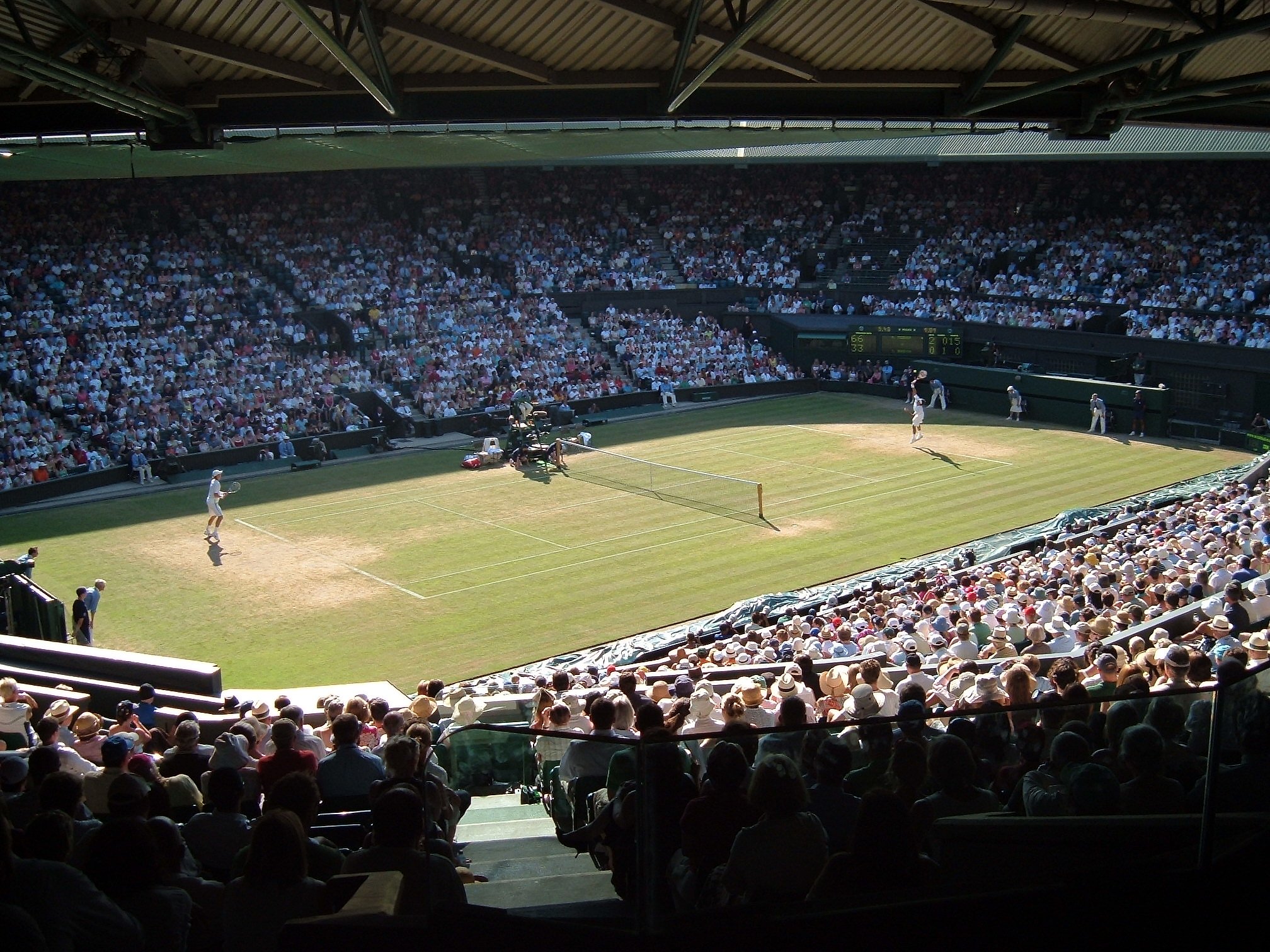 Flowers with Wimbledon sign behind