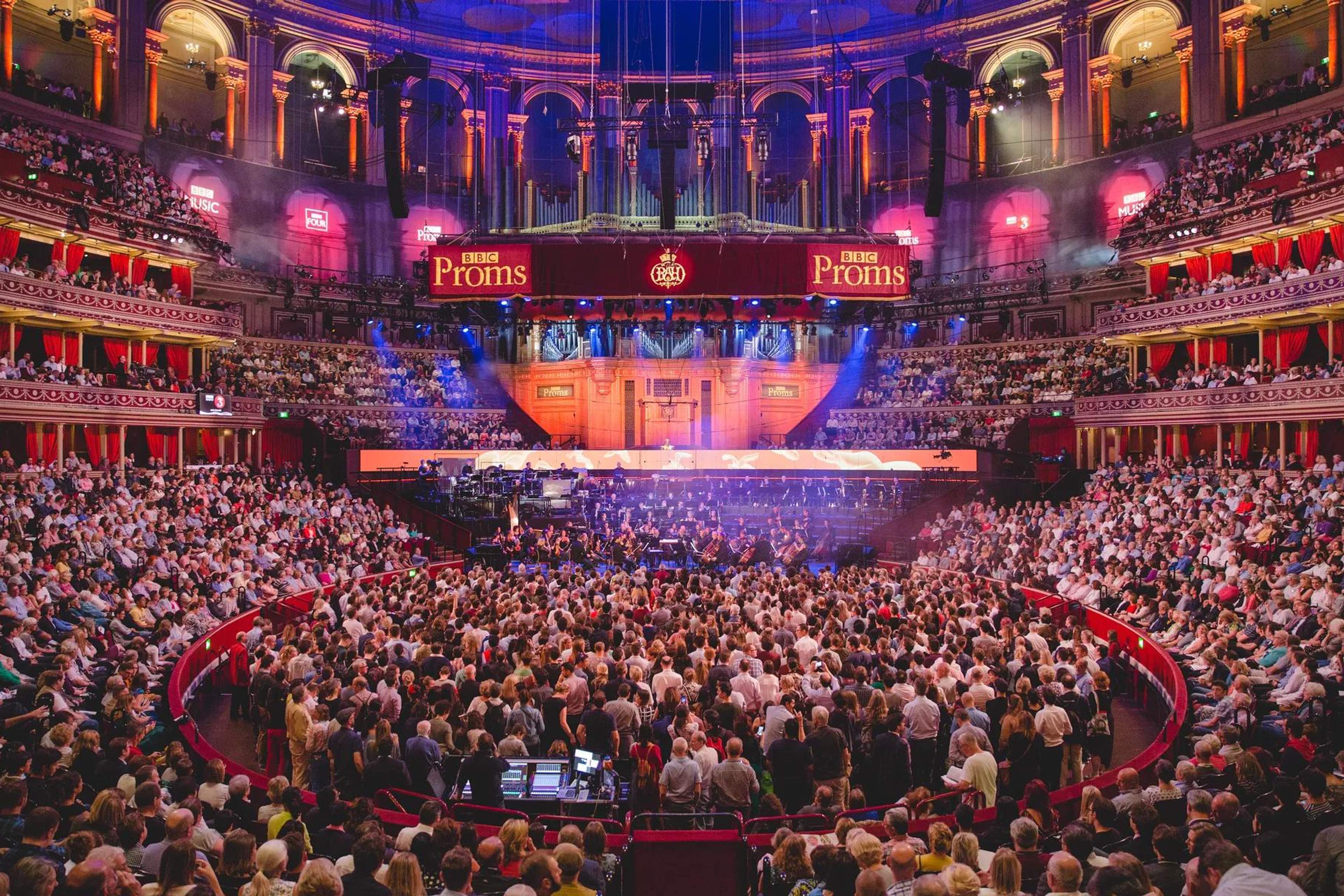 The Royal Albert Hall full for the Proms, the orchestra on stage under the BBC Proms banners