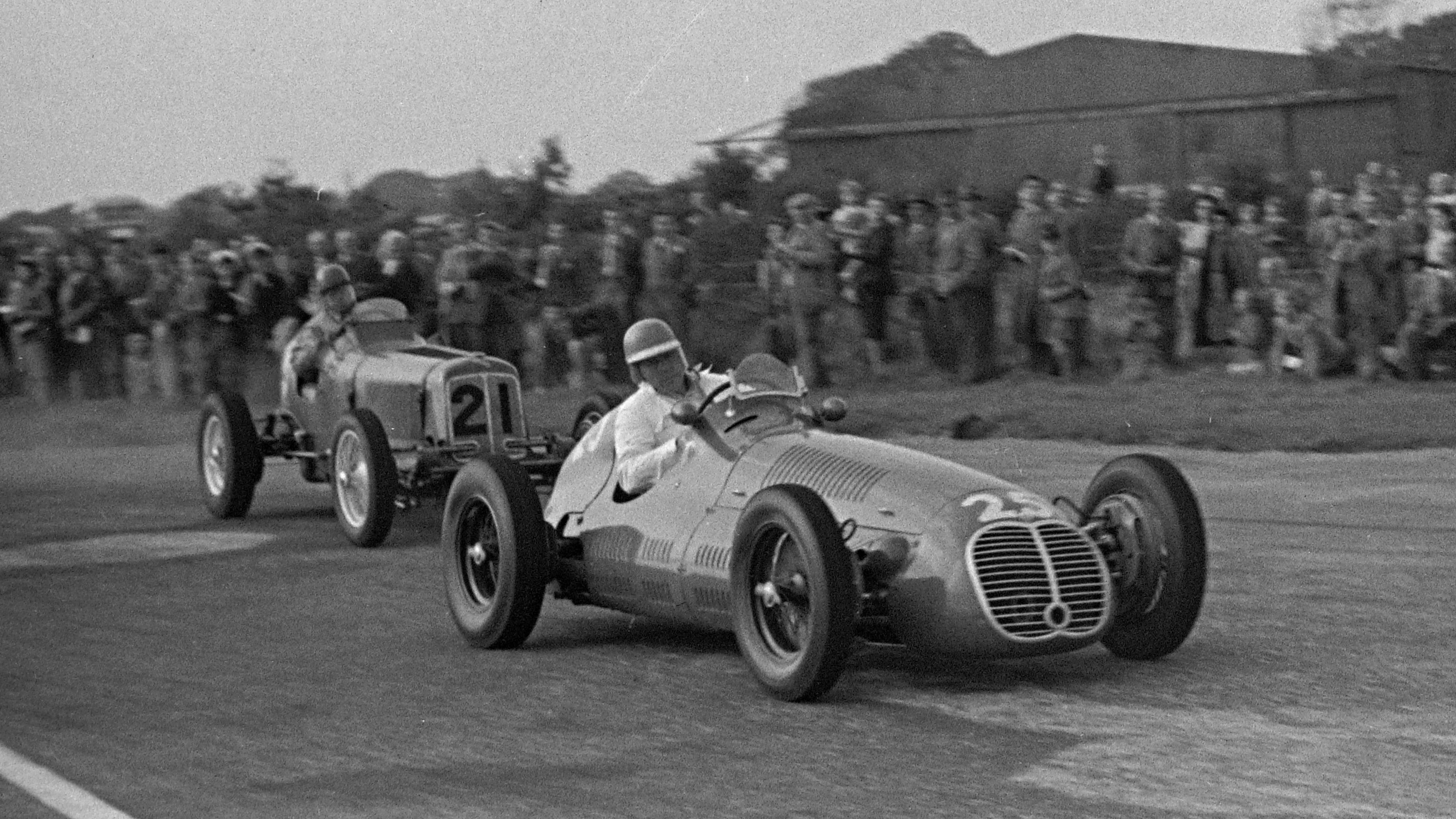 Vintage single-seater racing cars in the paddock at Goodwood Motor Circuit