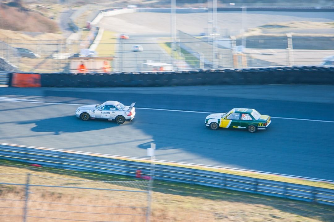 Two cars racing at Zandvoort, capturing the competitive spirit of the circuit's classic era