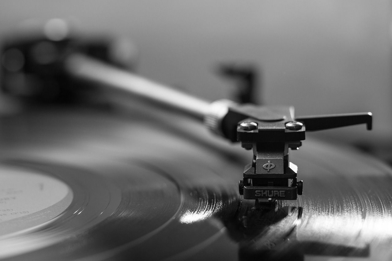 Vinyl record on a turntable, evoking the era of Born to Run and classic rock albums