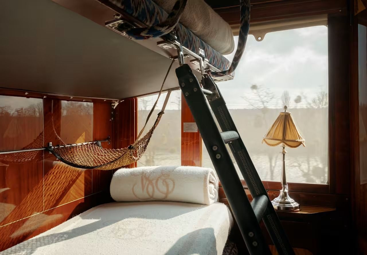 Restored historic cabin interior showing original Art Deco marquetry and fittings