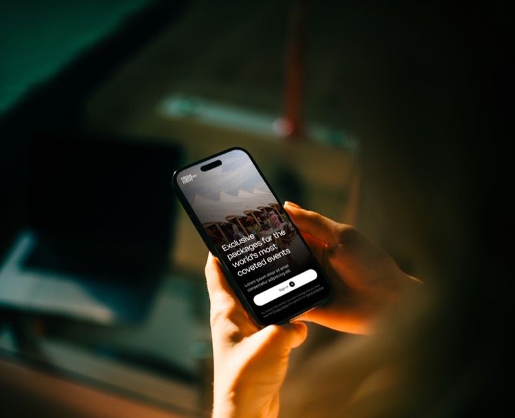 Hand holding a phone with the Imperial app