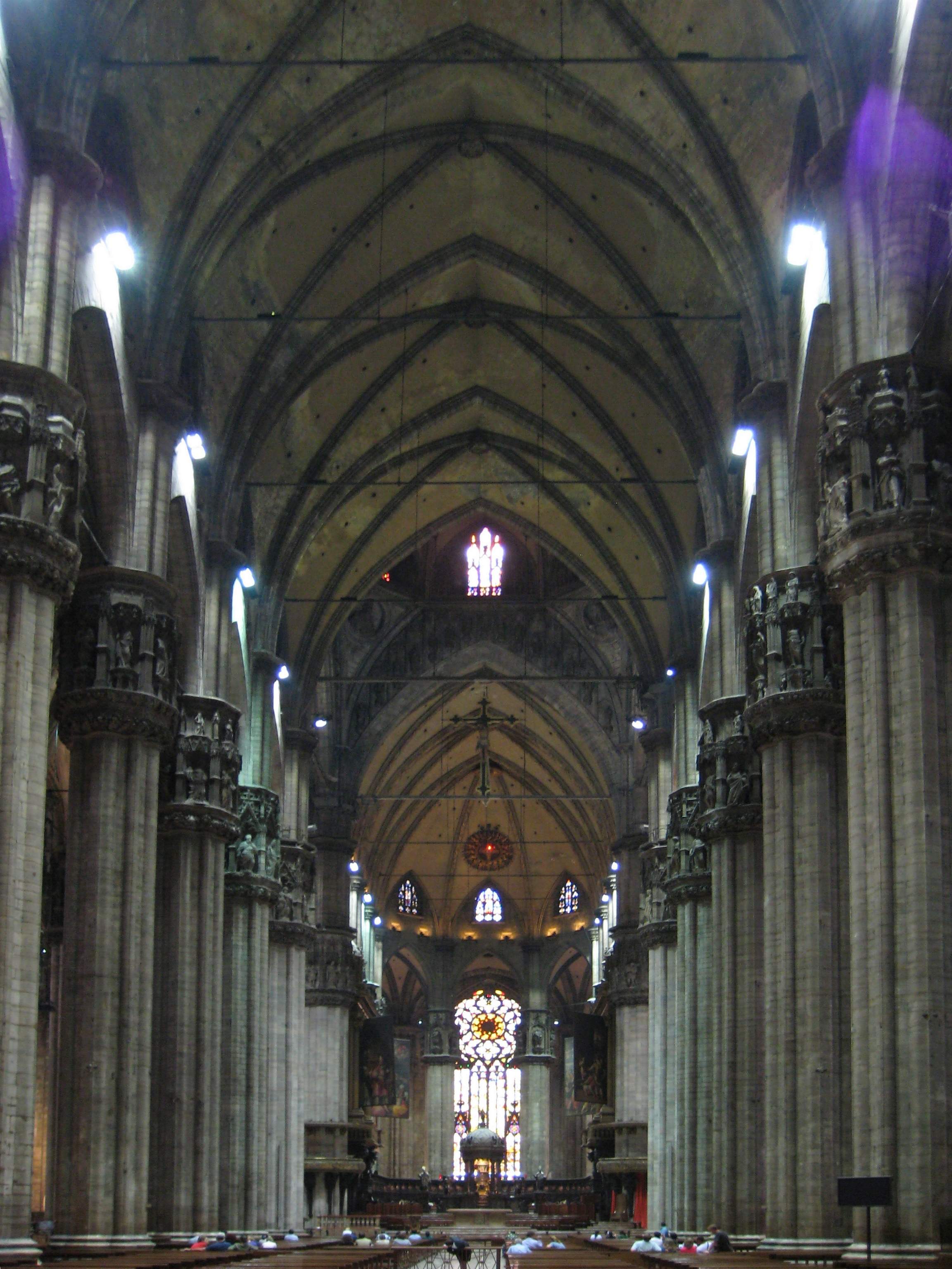 The empty nave of the Duomo di Milano looking towards the altar