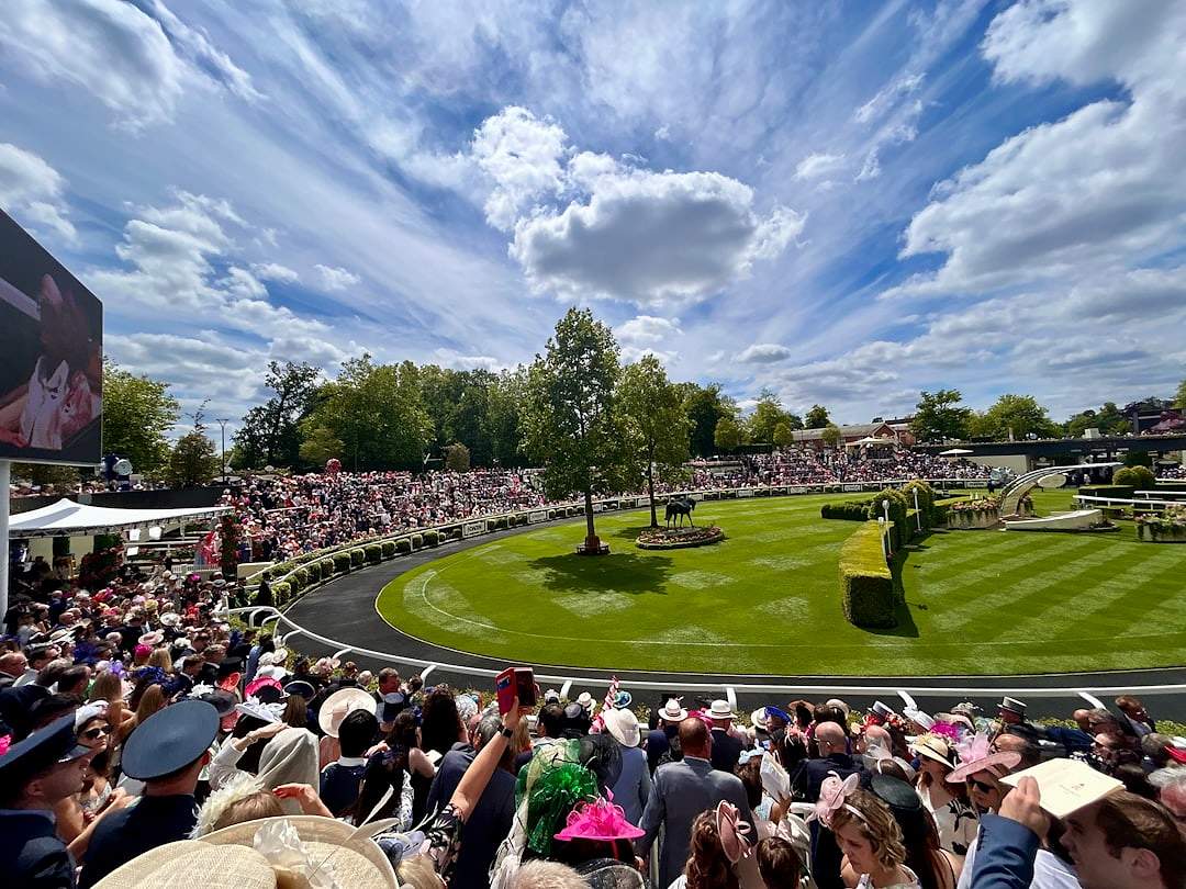 Ascot Racecourse grandstand and crowd during a summer race meeting