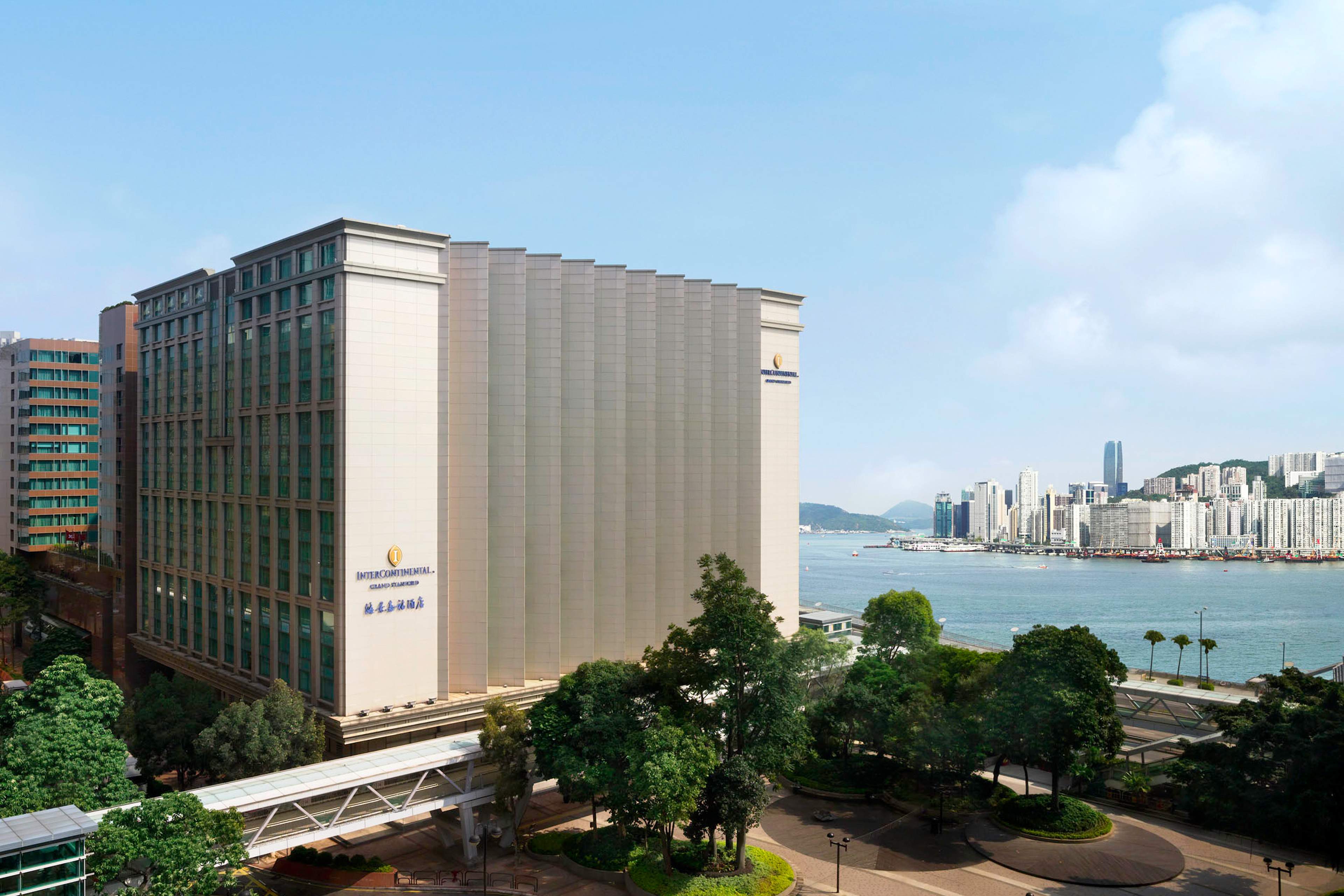 InterContinental Grand Stanford Hong Kong on the Victoria Harbour waterfront, with Hong Kong Island across the water