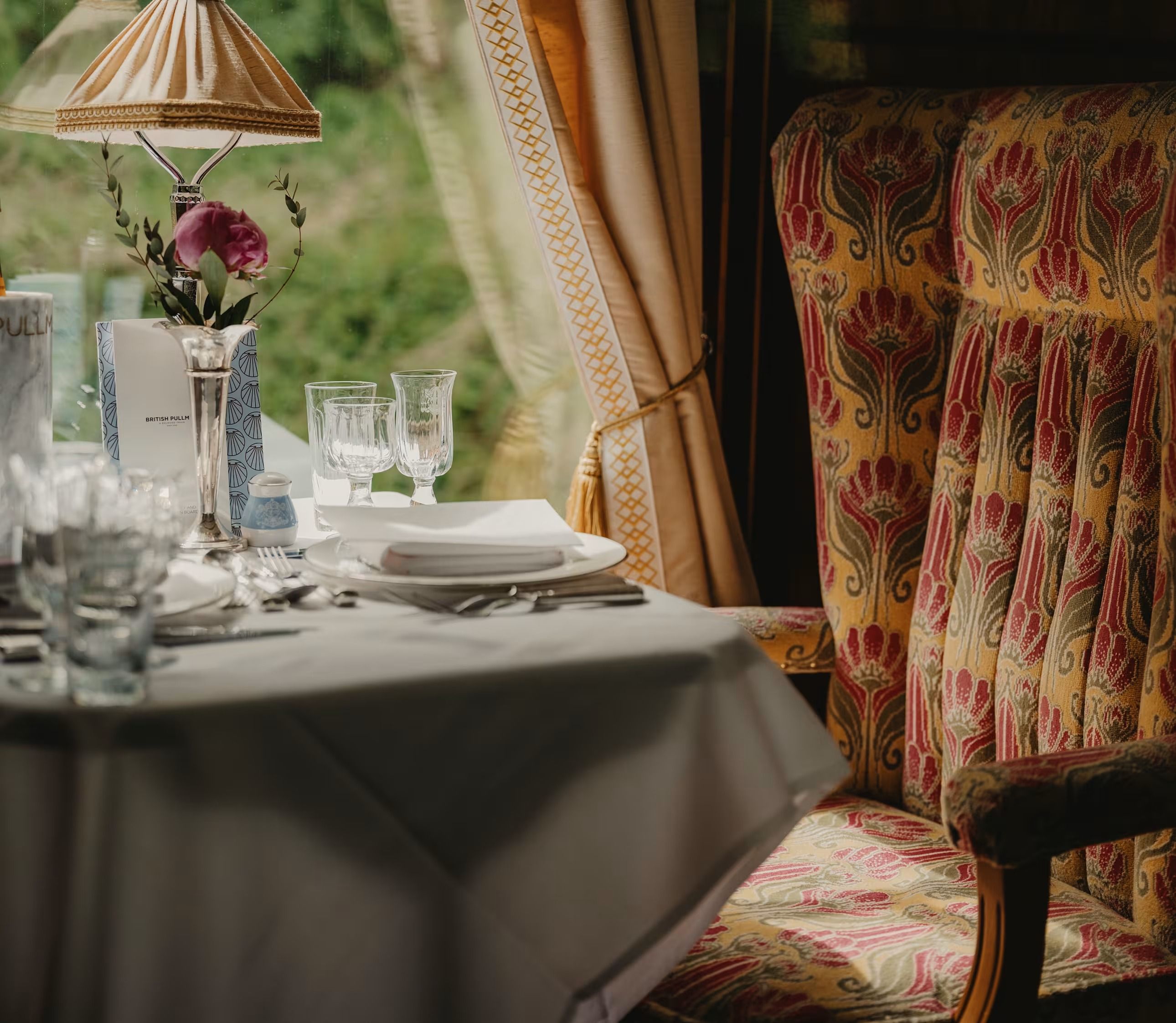 Interior of a restored 1920s Belmond British Pullman carriage with Art Deco details