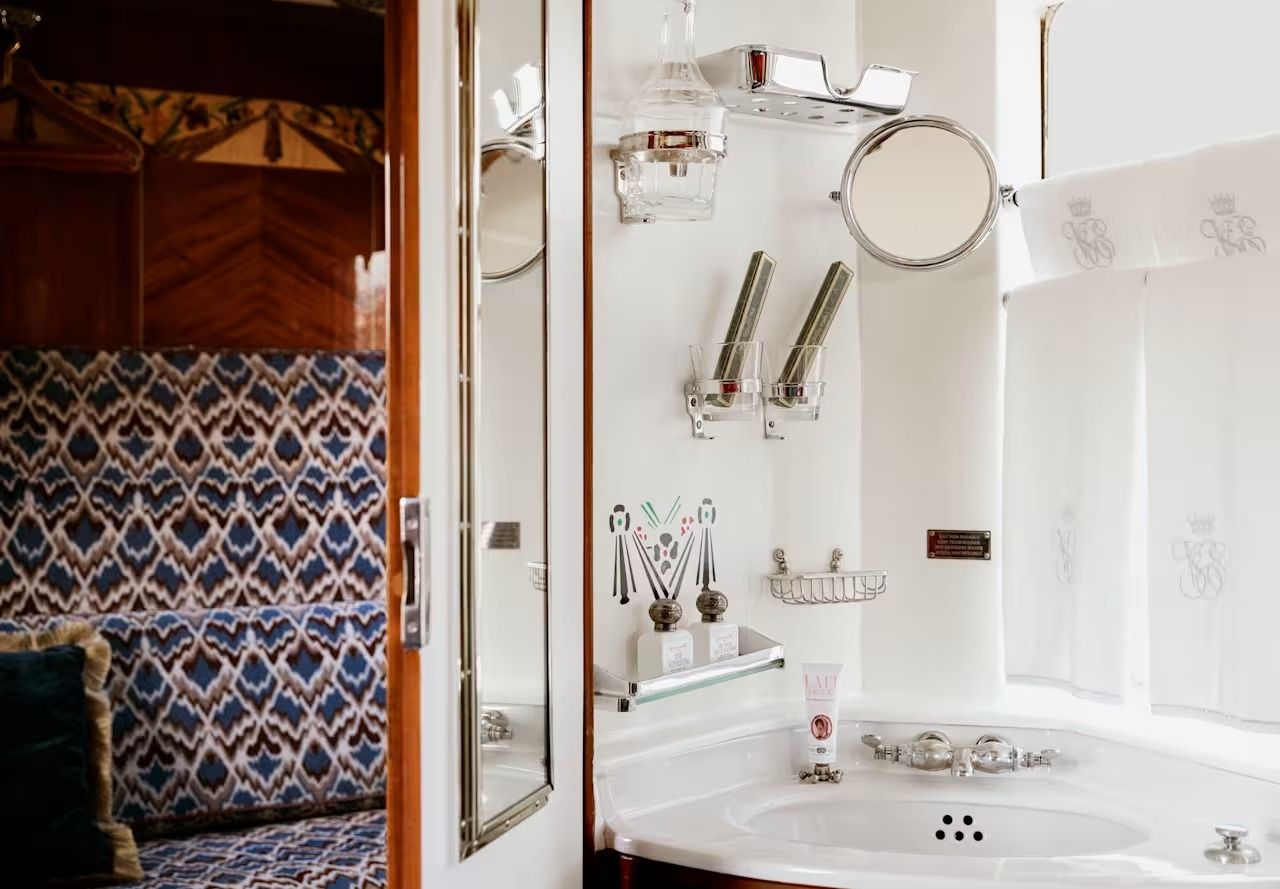 Restored historic cabin aboard the Venice Simplon-Orient-Express showing Art Deco woodwork and detailing