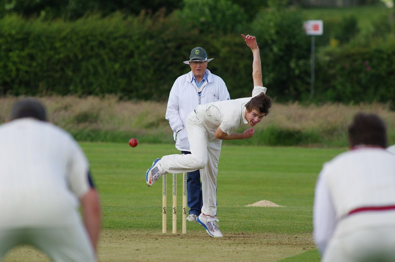 Cricket being played on a green pitch, evoking the behind-closed-doors 2020 series