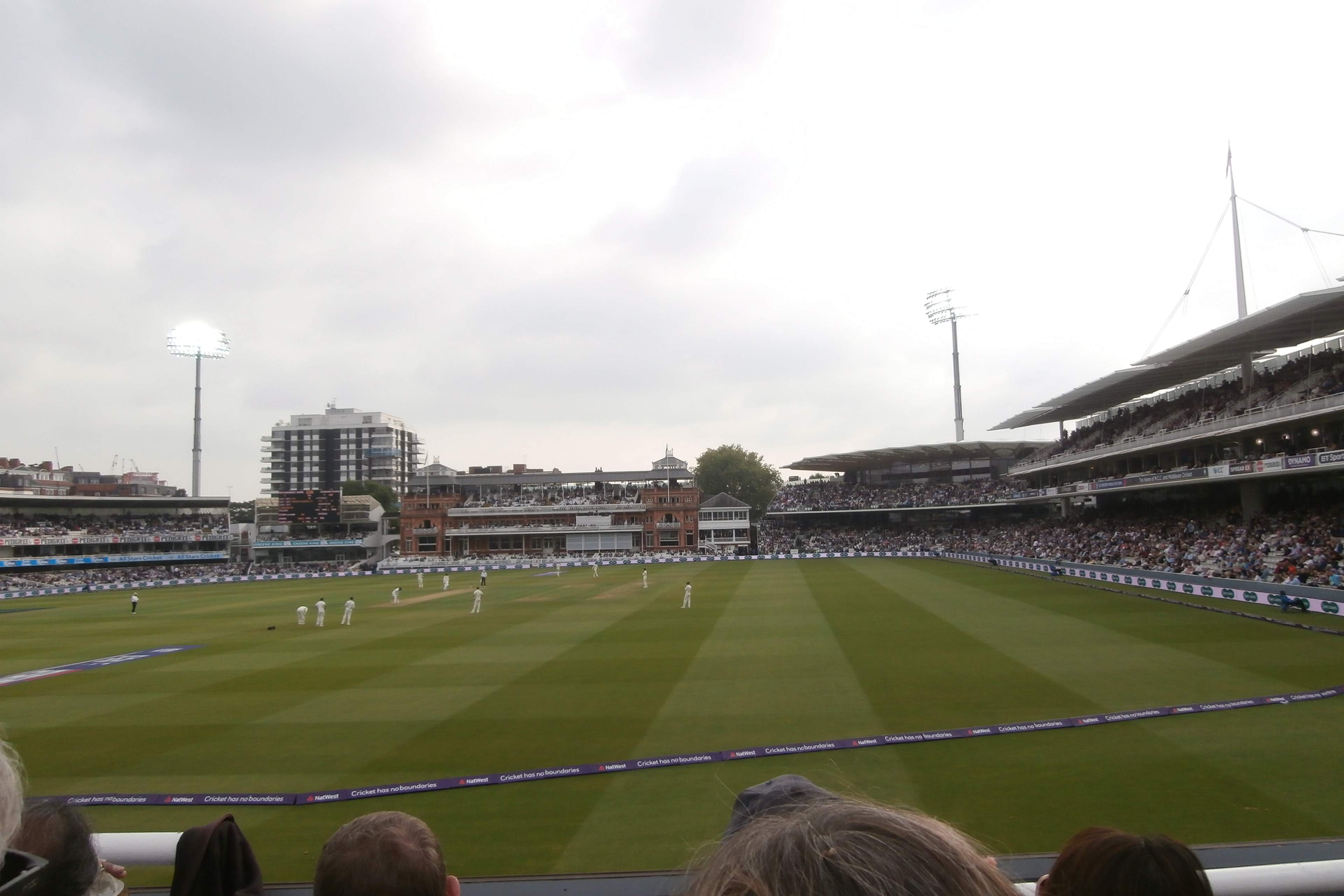 Lord's Cricket Ground on a full day's play, the Victorian Pavilion across the ground