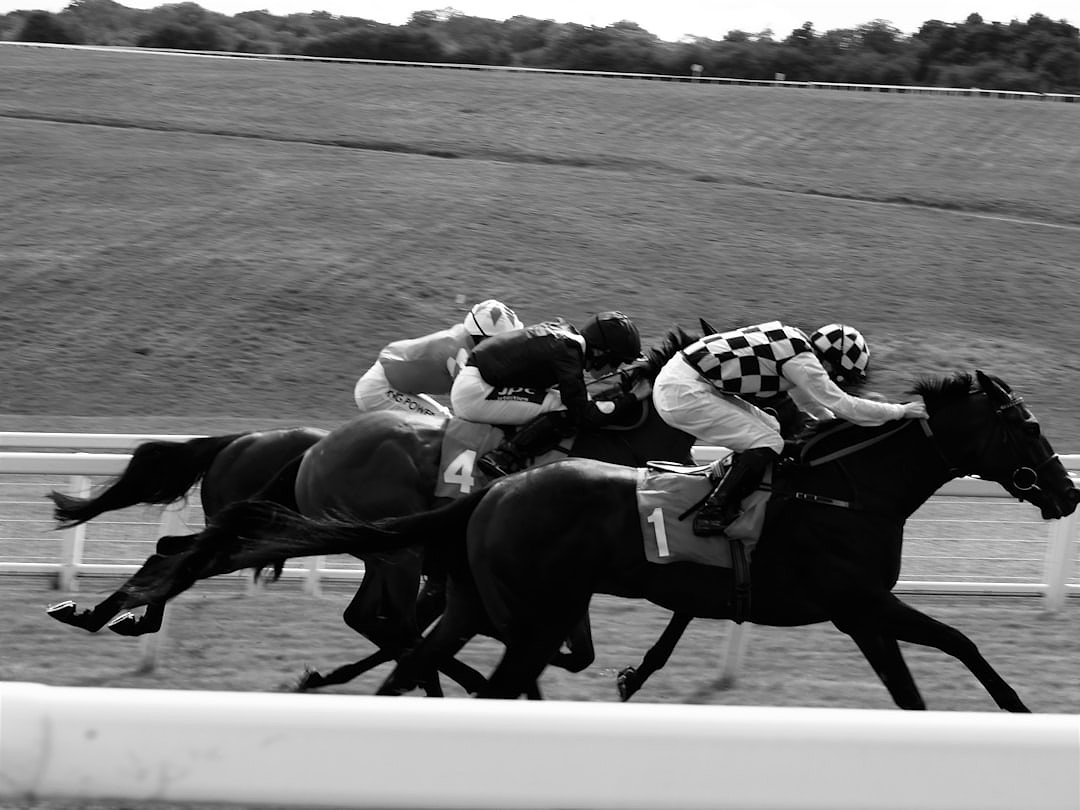 Black and white photograph of horse racing, evoking the Edwardian era of the Derby
