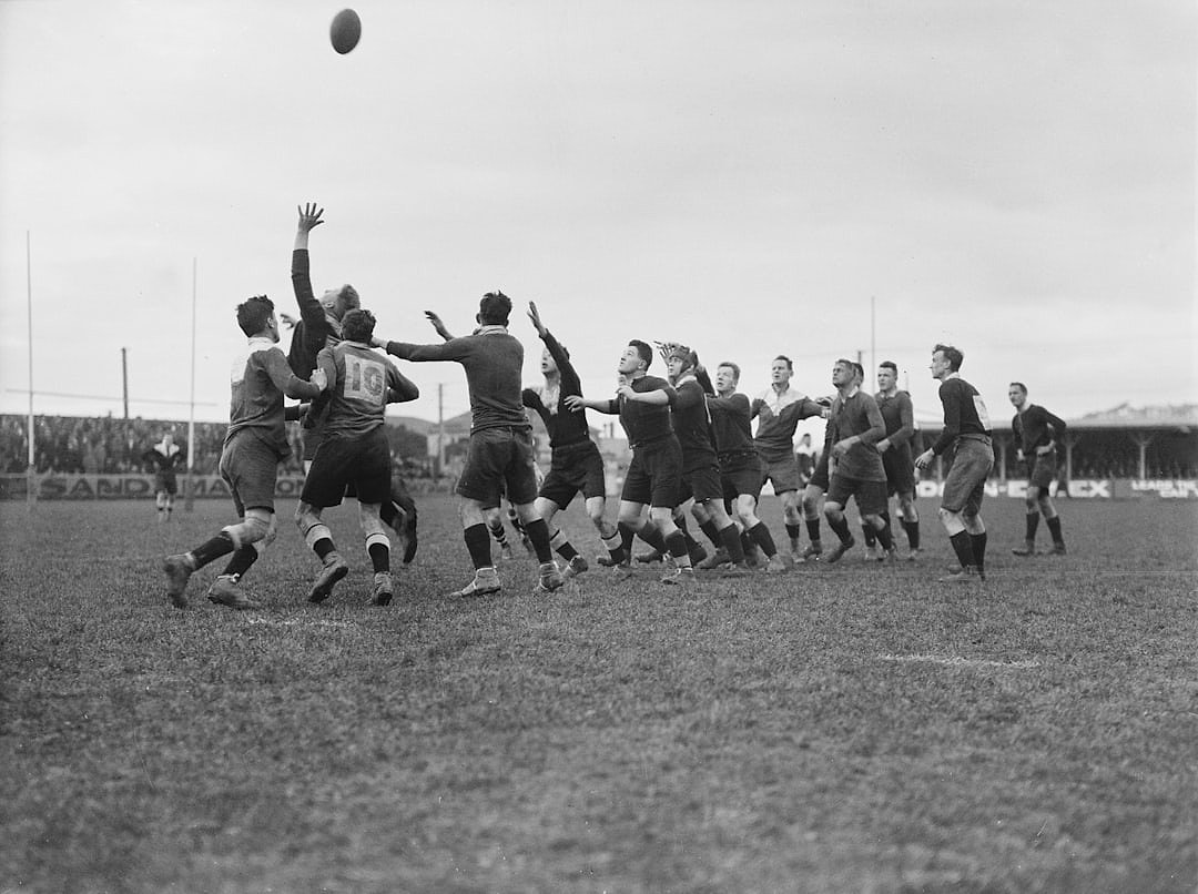 Vintage photograph of an early rugby match, evoking the origins of the sport in the 1880s