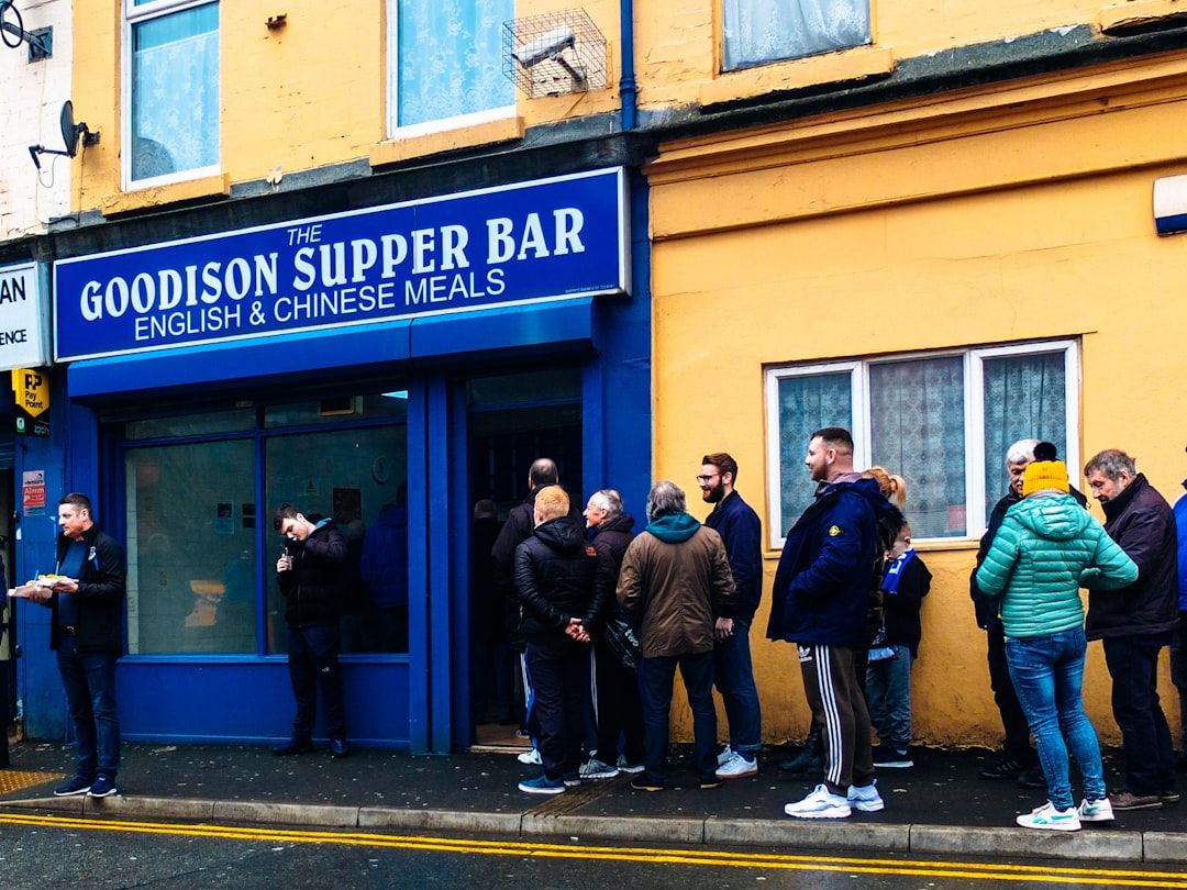 Goodison Park exterior on matchday with fans approaching the ground