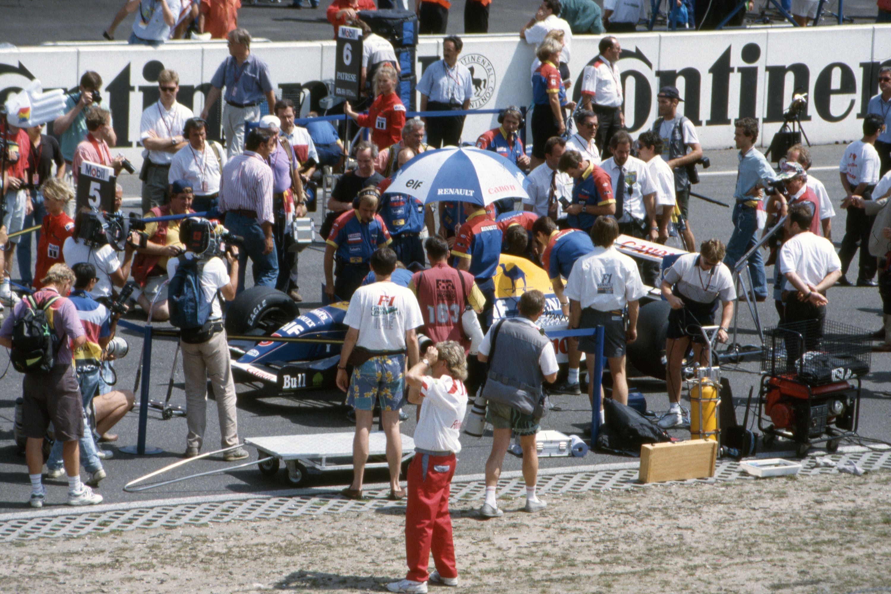 Racing car on track, evoking the intensity of close Formula 1 competition