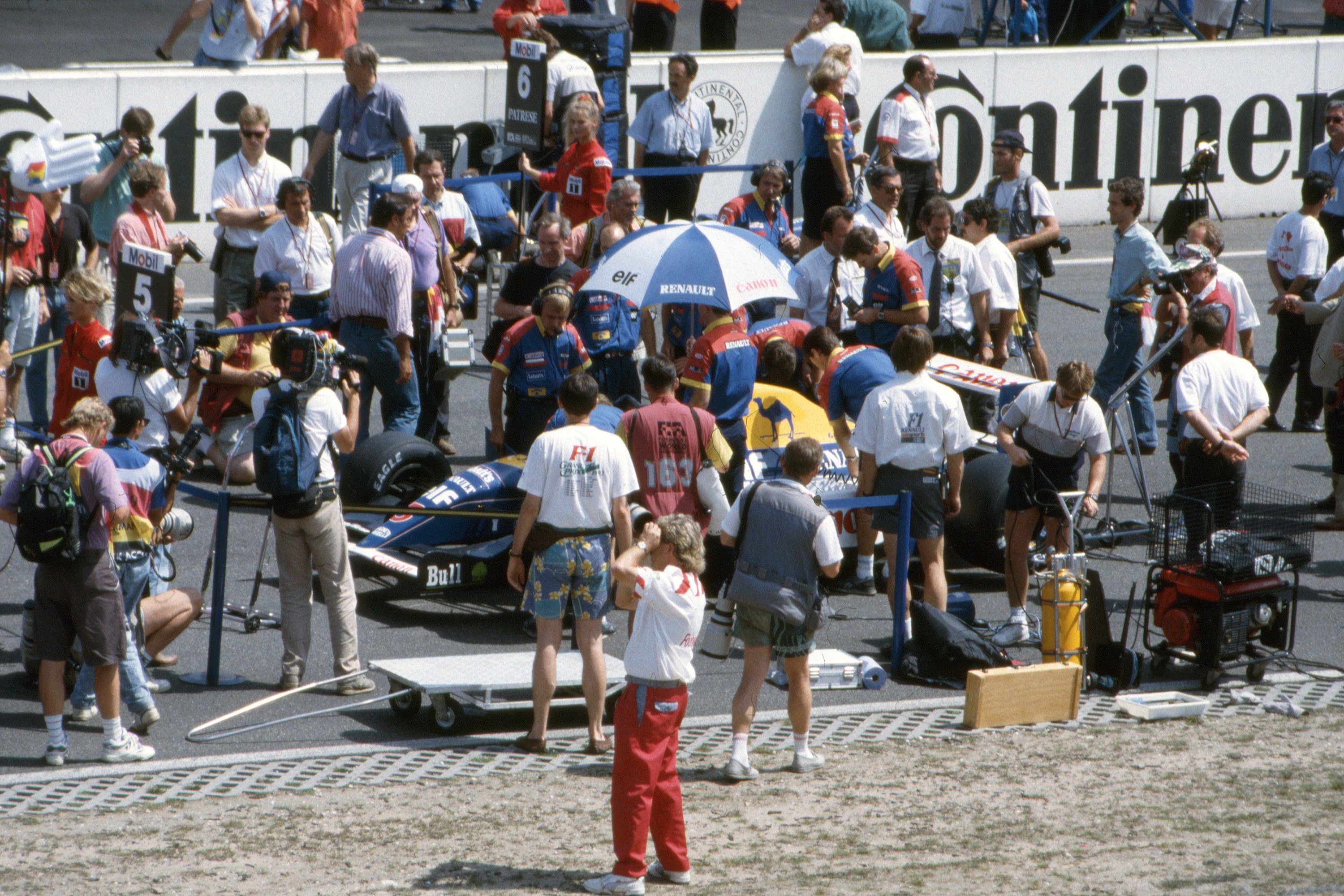 Racing car on track, evoking the intensity of close Formula 1 competition