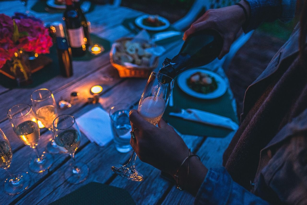 Champagne being poured into elegant glasses at a celebration