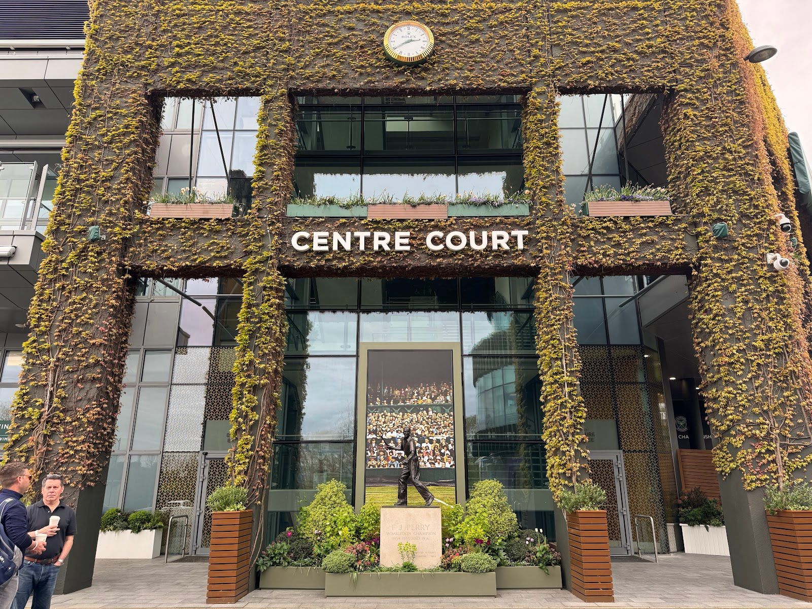 Wimbledon courts and grandstand crowds