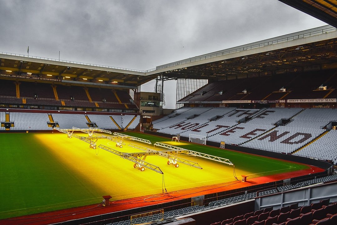 Villa Park pitch under floodlights at night