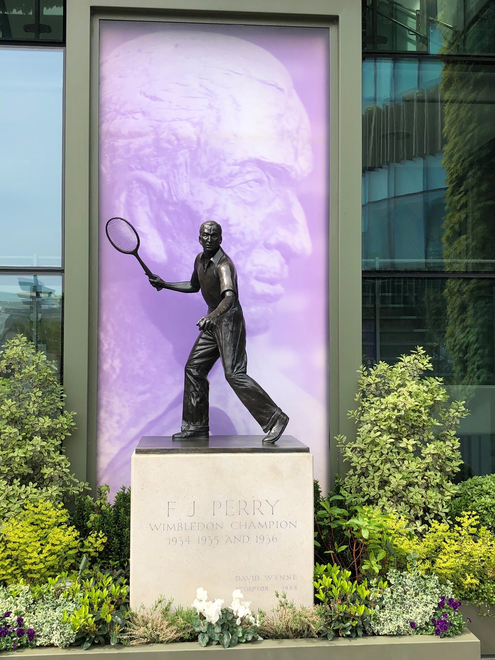 Wimbledon green and purple branding outside the All England Club