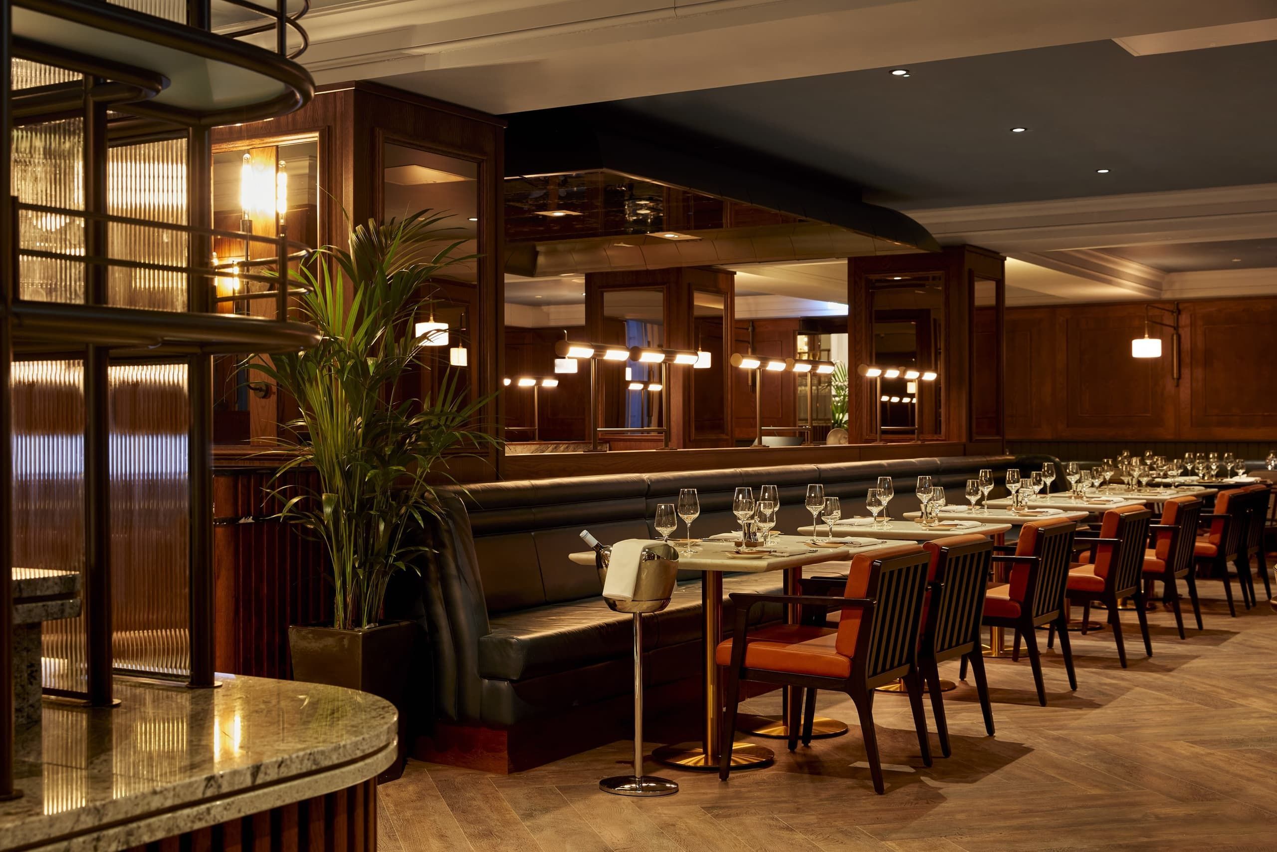 The Sorting Room at The Parkgate, a panelled dining room with leather banquettes and set tables