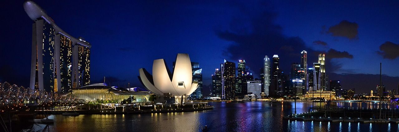 Singapore Marina Bay skyline at night with Marina Bay Sands and city lights