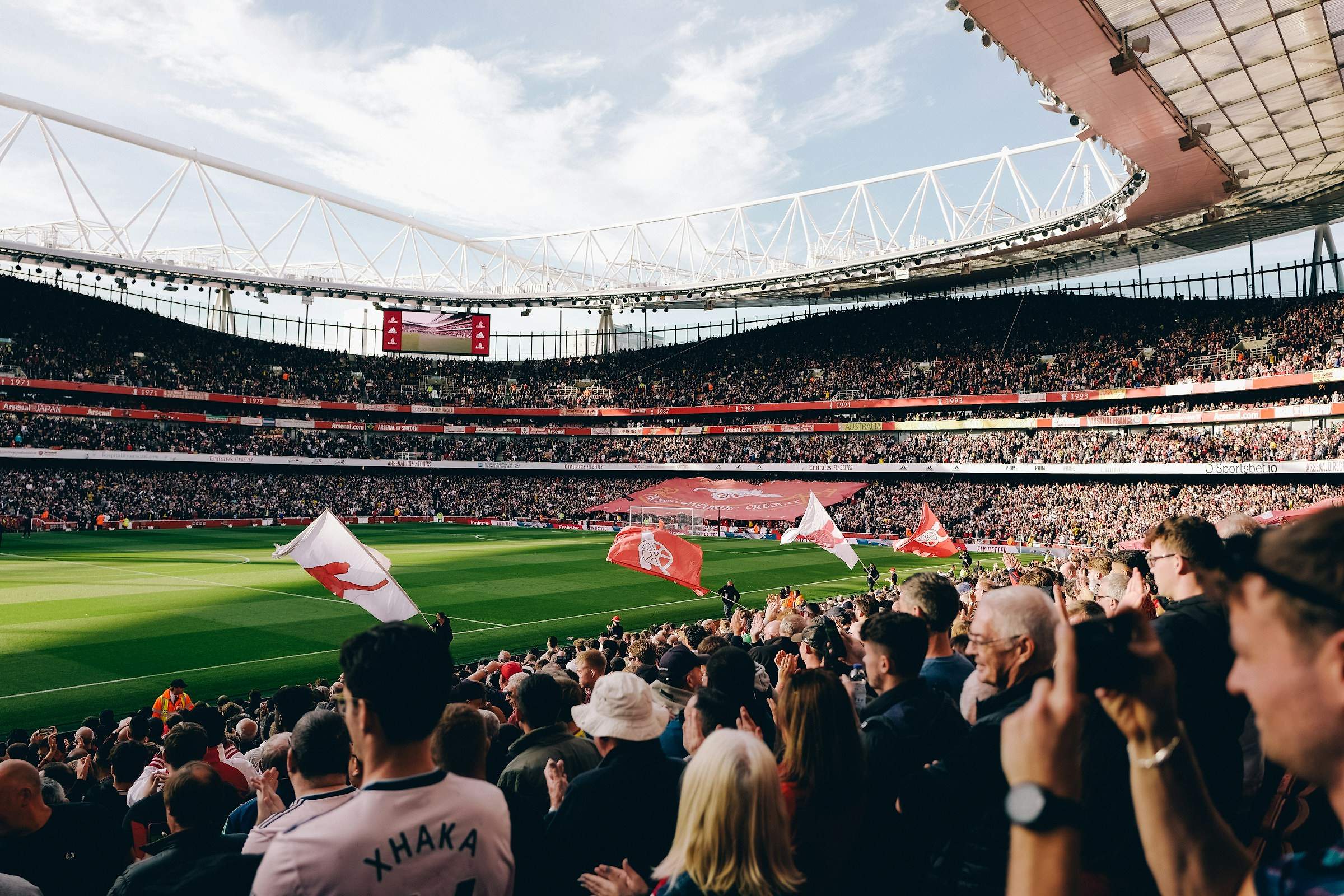 Premier League football match in a packed stadium