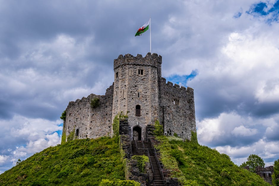 Cardiff Castle under dramatic skies, representing the Welsh rugby heartland