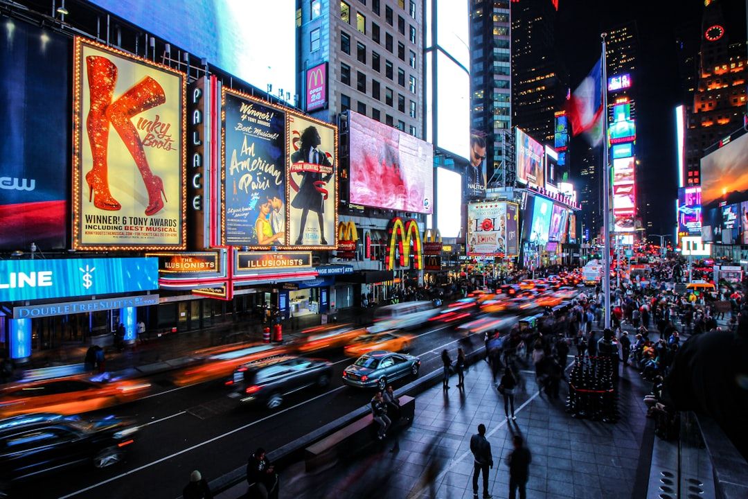 Broadway theatres lit up at night in New York