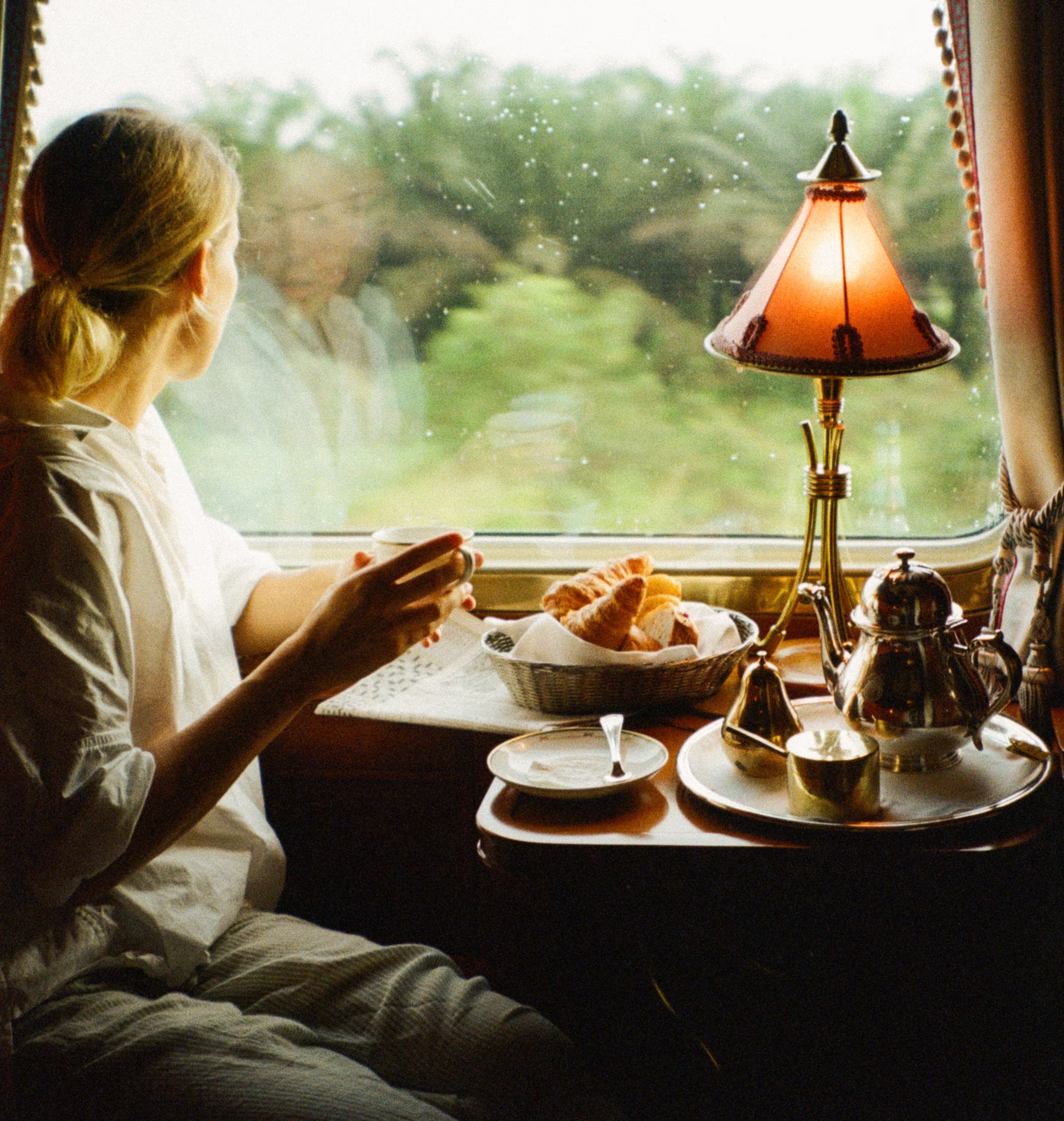 Vintage steam locomotive on railway tracks, evoking the golden age of rail travel