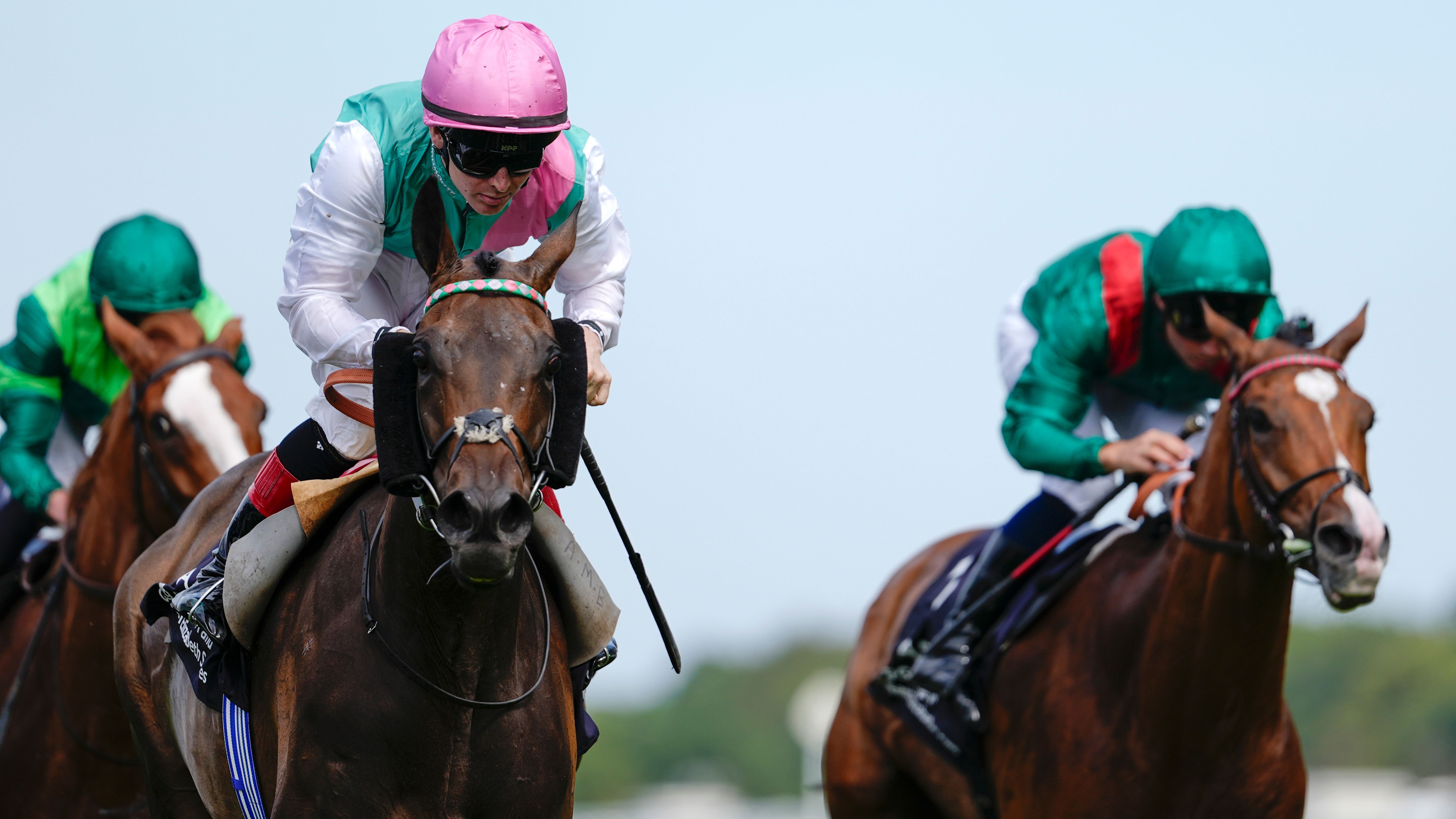 Vintage horse racing with two jockeys competing
