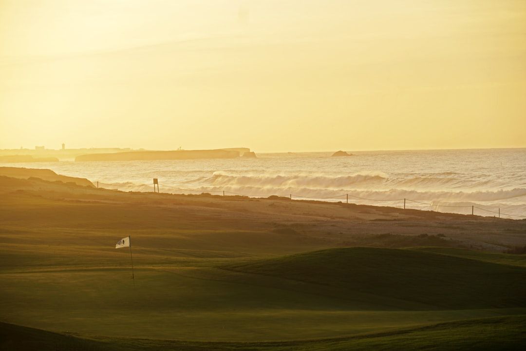 Links golf course at sunset, evoking the famous Duel in the Sun at Turnberry
