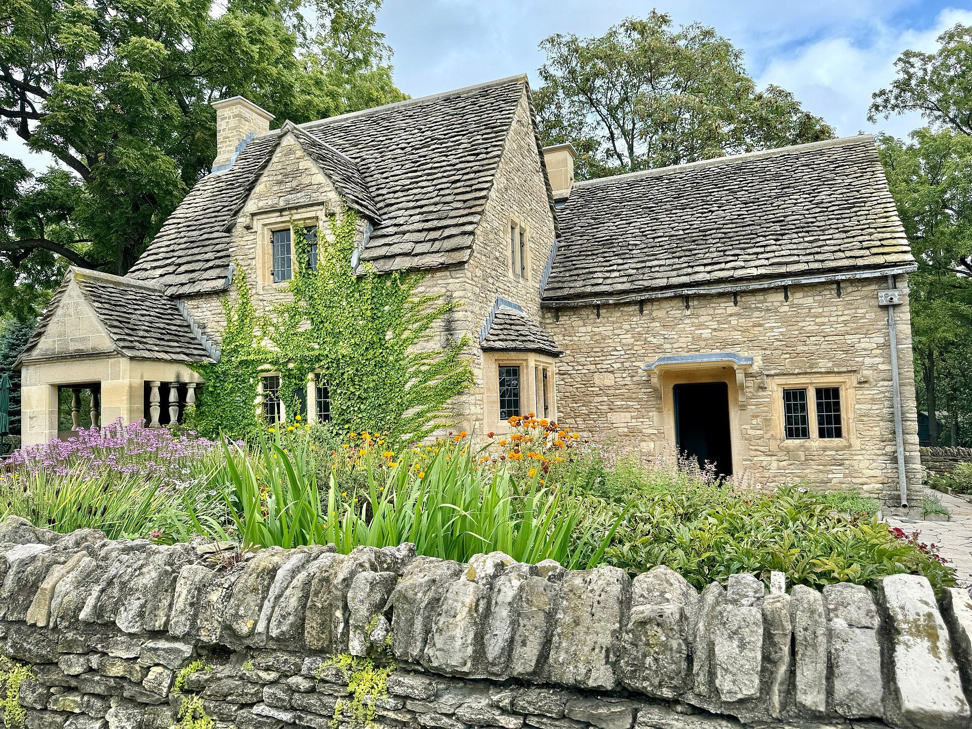 A Cotswolds village with stone cottages on the high street
