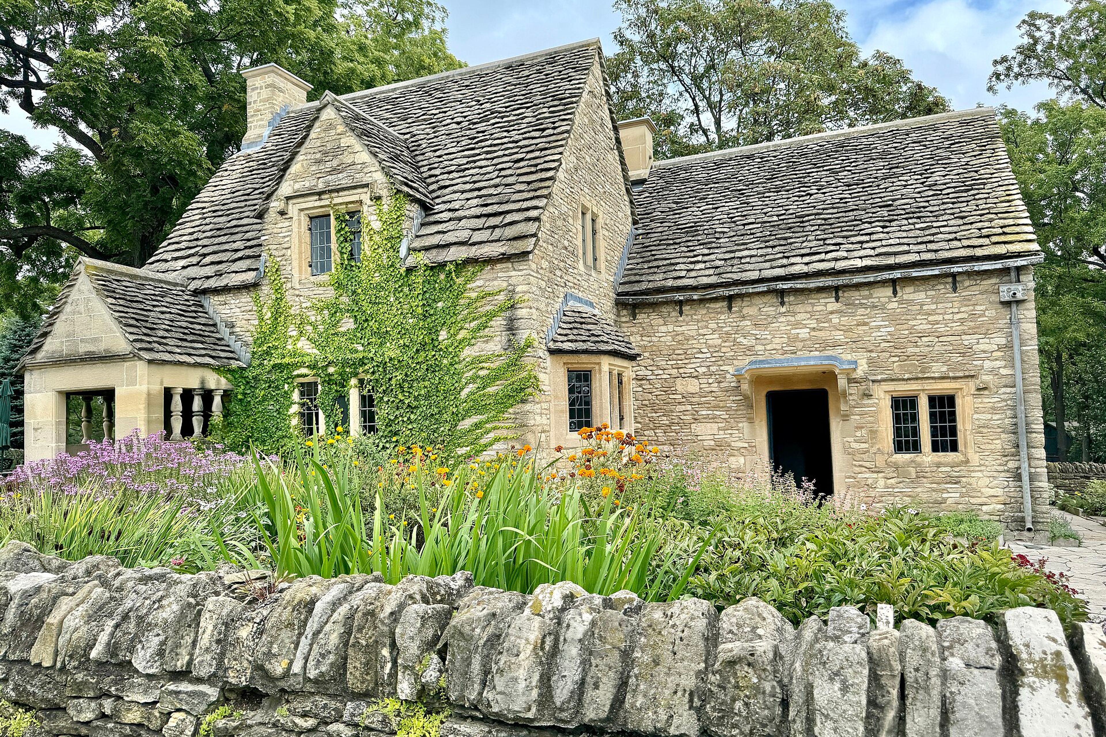 A Cotswolds village with stone cottages on the high street