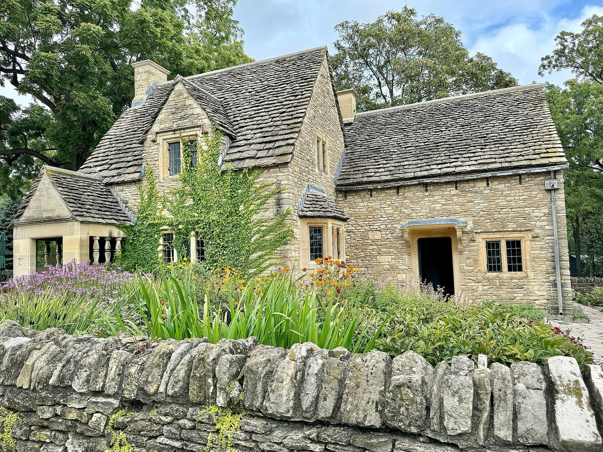 A Cotswolds village with stone cottages on the high street