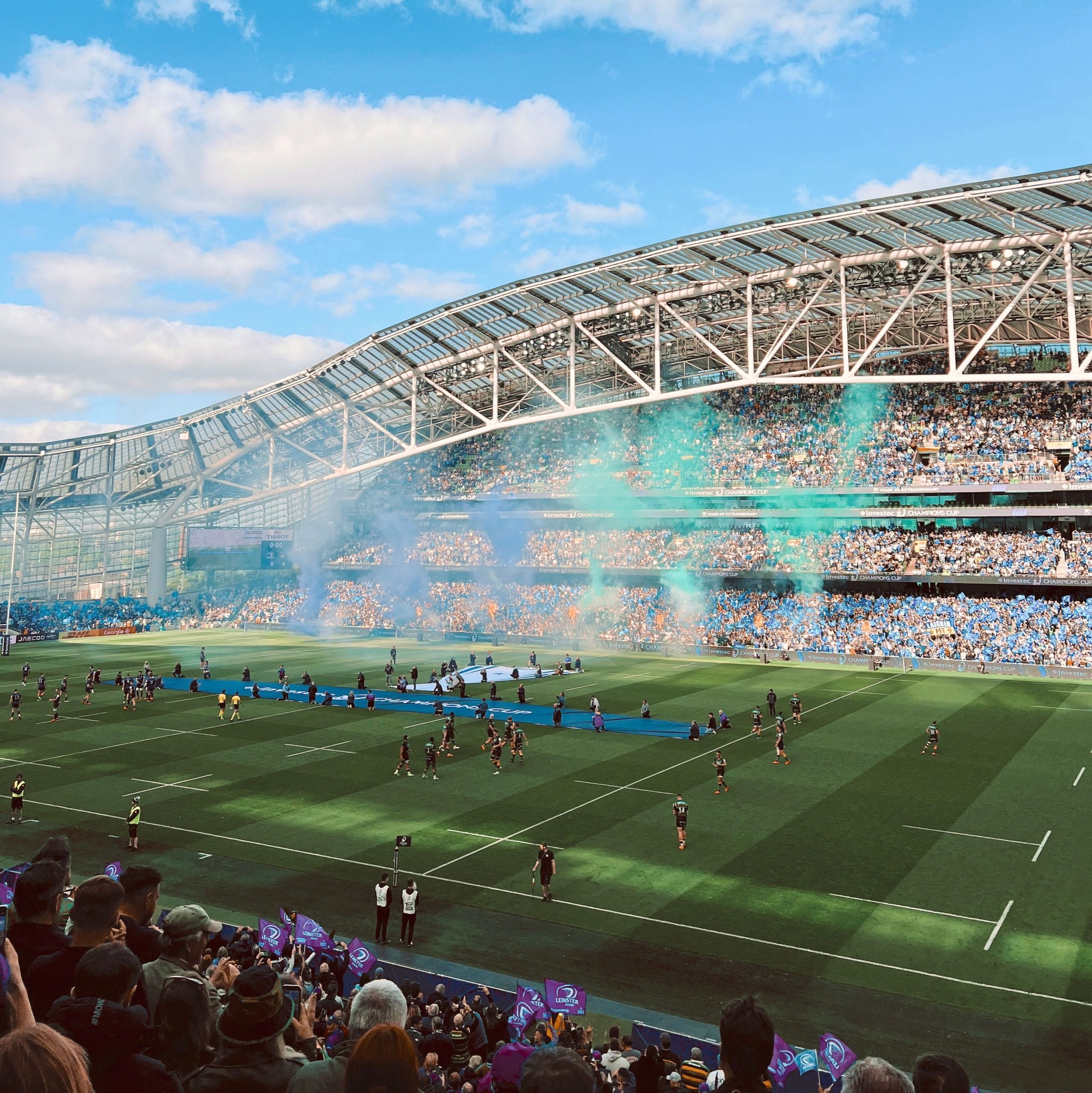 The Aviva Stadium from the stands on a match day, the teams walking out to a full crowd