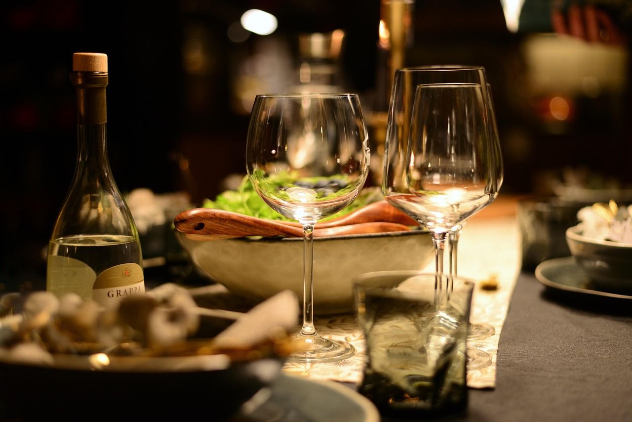 Banquet table with crystal glasses set for a formal dining event