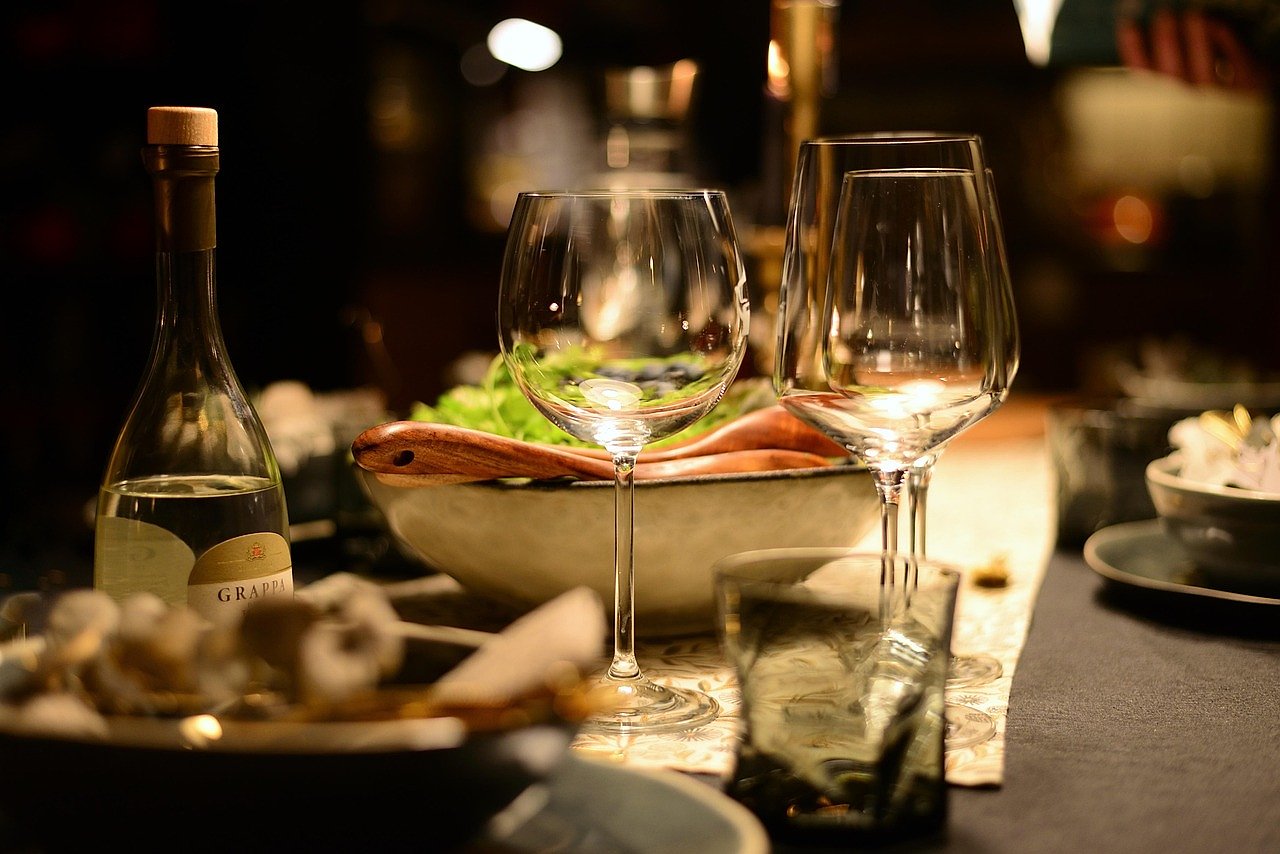 Banquet table with crystal glasses set for a formal dining event