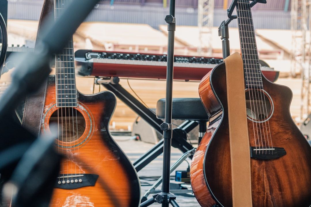 Acoustic guitars representing the folk music score of the Benjamin Button musical