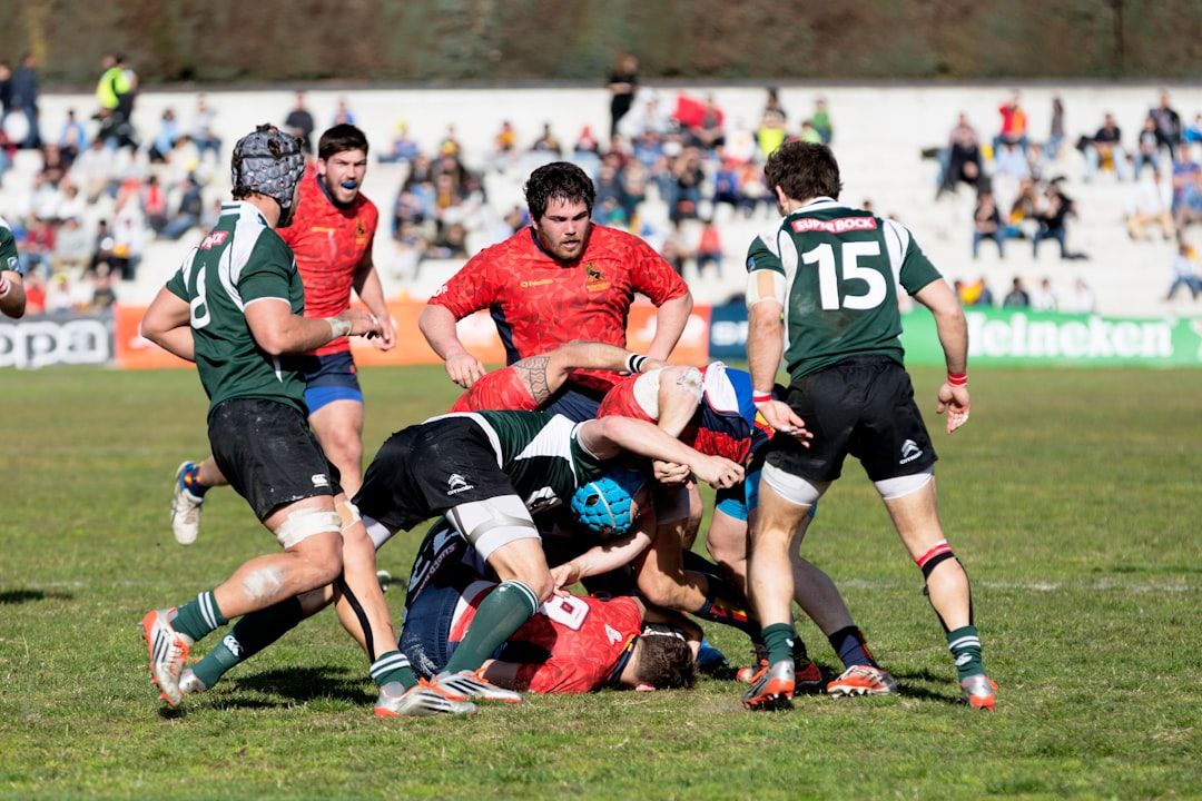 Rugby sevens match play with players competing for the ball