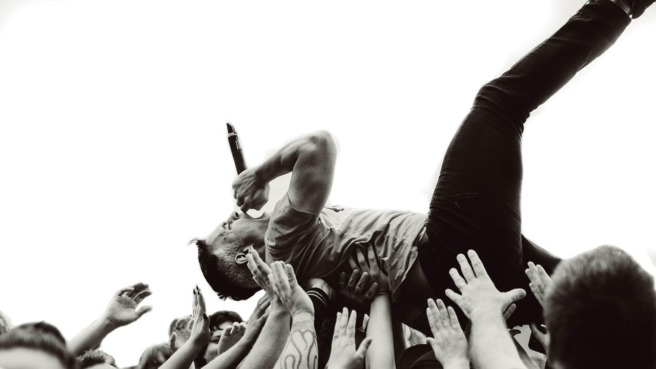 Live music festival with energetic crowd