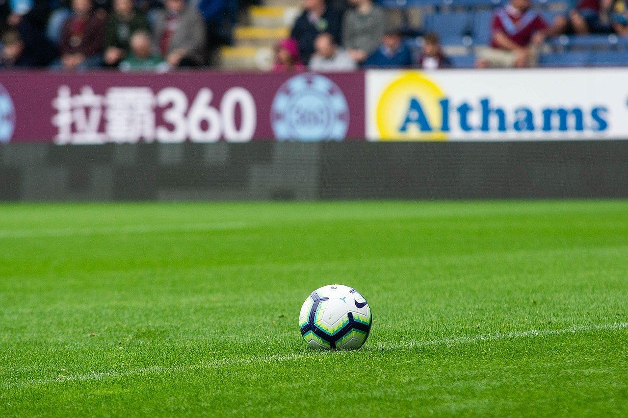 A pristine football pitch ready for a Premier League match