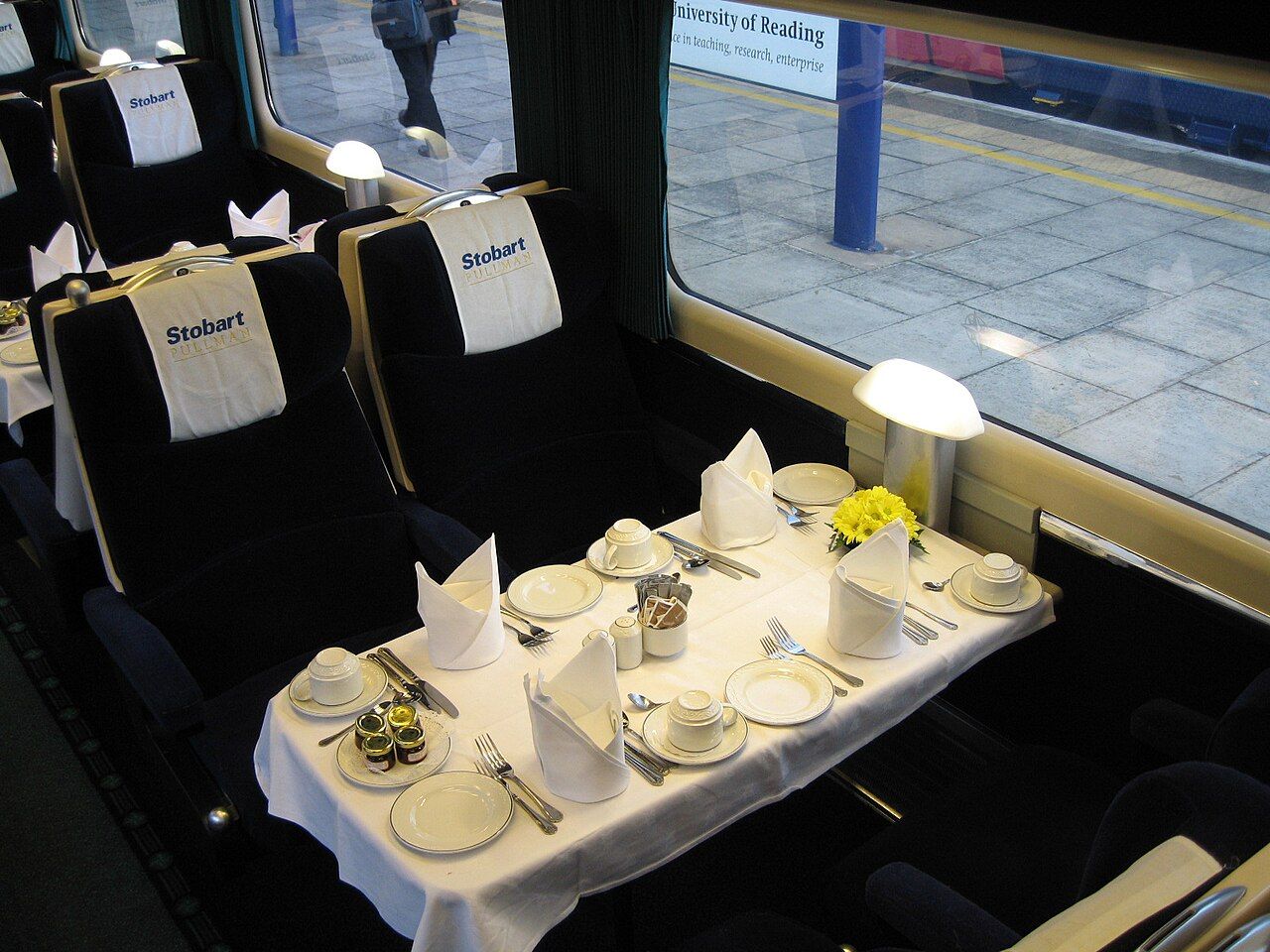 Luxury Pullman carriage interior laid for fine dining